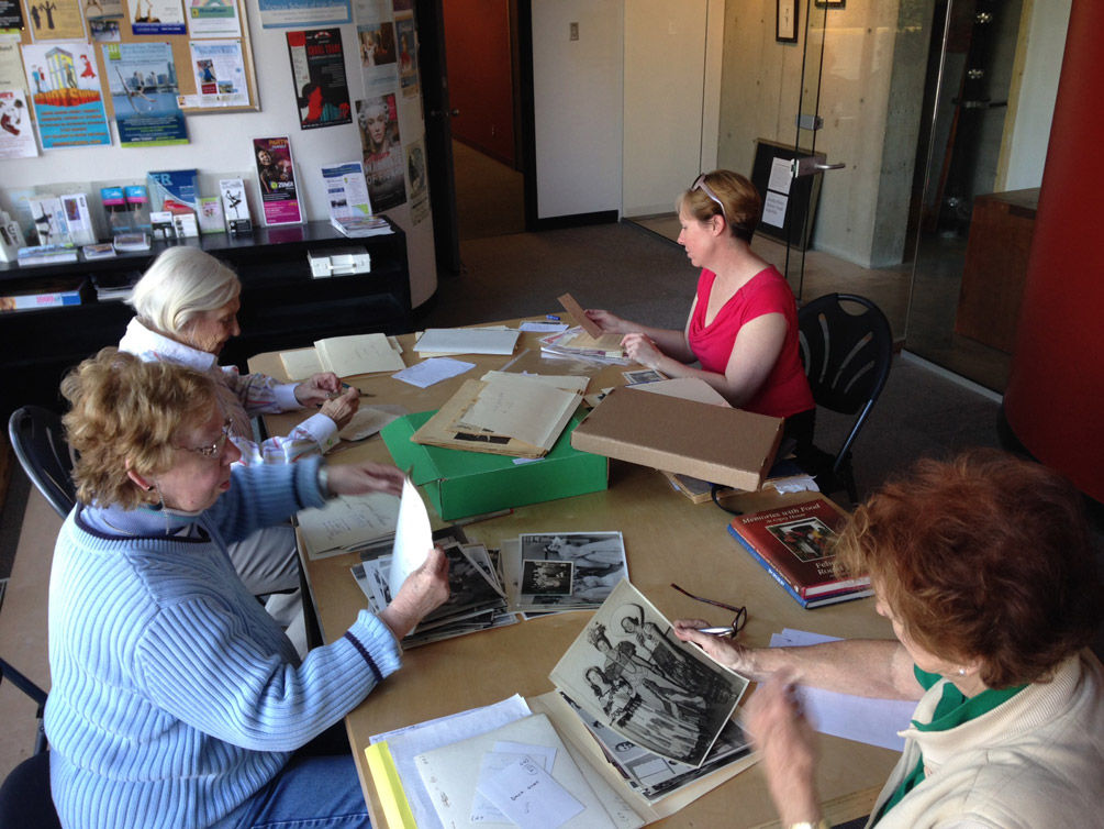 Archives committee reviewing and cataloguing materials